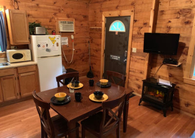 Mountaineer Cabin - Dining and Fireplace