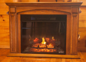 Vacation Lodges in West Virginia | Logs Burning in a Fireplace
